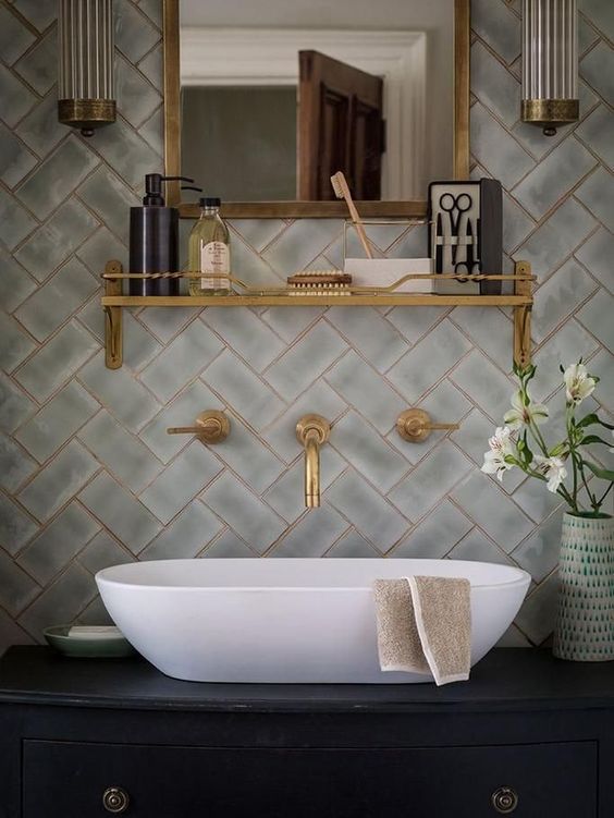 تشطيب حمامات فى دبي - أحدث ديكورات 2026 - شركة مكة 75 gray and gold bathroom